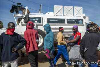 Thousands of hungry people line up for food in South Africa