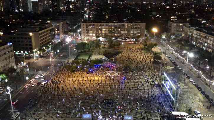 Thousands protest Israel coalition deal on eve of court date