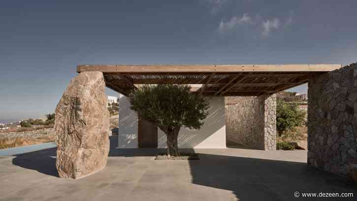 K Studio creates stone holiday home on Mykonos overlooking the Aegean Sea