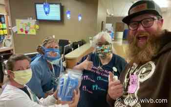 Nurses make see-through face masks so deaf father can read their lips during birth of daughter