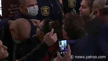 Armed protesters storm Michigan Capitol over stay-at-home orders