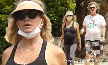 Goldie Hawn and Kurt Russell brave the heat as they keep fit on a walk during quarantine break