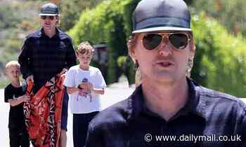 Barefoot Owen Wilson risks $1,000 fine by heading to Malibu beach, towel in hand, with his two sons