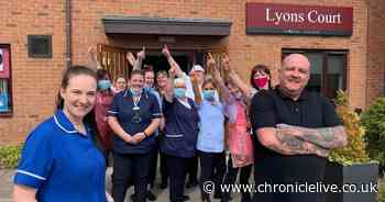 See staff join in sing-along to Build Me Up Buttercup outside care home