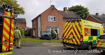 Driver taken to hospital after car crashes into house