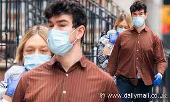Chloe Sevigny cradles newborn baby as she and boyfriend Sinisa Mackovic head home