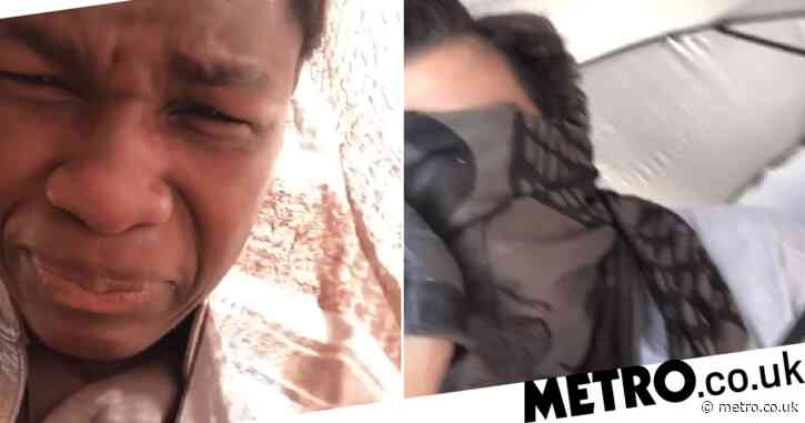 John Boyega shelters from sandstorm with Oscar Issac in cool throwback for Star Wars Day