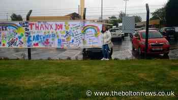 Two friends make inspiring thank you NHS banner for Royal Bolton Hospital