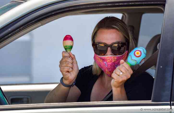 Drive-through Cinco de Mayo fiesta says gracias to Huntington Beach school staff