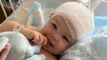 'He’s miraculous': Community comes together to celebrate Ontario toddler who beat brain cancer