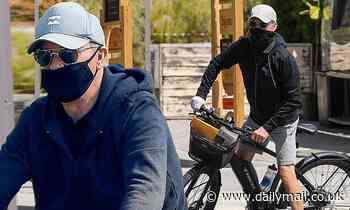 Batman vet Michael Keaton, 68, looks fit in shorts as he wears a mask