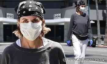 Lisa Rinna looks sporty as she steps out with her face mask to run an errand in Beverly Hills