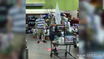 A man wore what appeared to be a KKK white hood on a trip to the grocery store