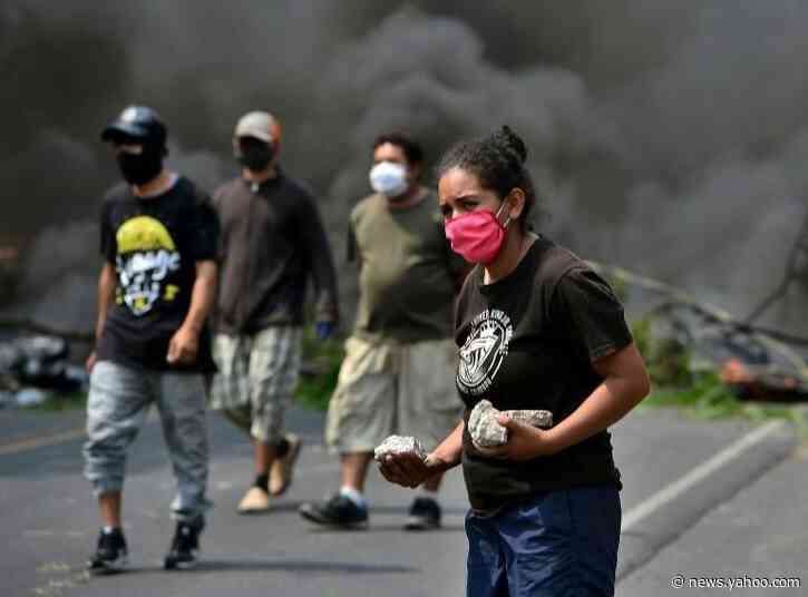 Hondurans block highway to prevent COVID-19 burials