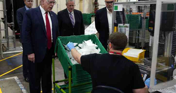 Trump tours, touts mask factory — but no mask for him