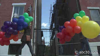 Philadelphia woman is brightening spirits with rainbow balloons