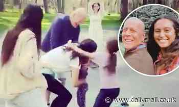 Bruce Willis' wife Emma Heming and ex Demi Moore cheer on his daughter Evelyn