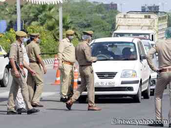 A city in India is ordering all of its residents to download the government's controversial COVID-19 contact tracing app or face jail time