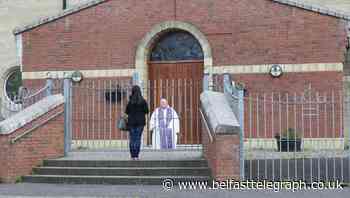 Socially-distanced queues in west Belfast as priest hears confessions - Belfast Telegraph
