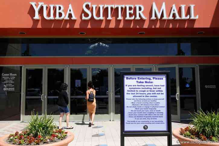 California governor allows some retail reopening with limits