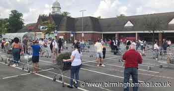 Huge Bank Holiday queues as Tesco launch half price sale