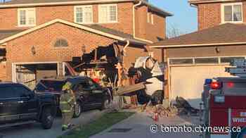 Driver arrested after car barrels through two homes in Markham