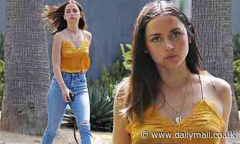 Ana de Armas is a vision of spring as she steps out in a marigold singlet for dog walk in Venice