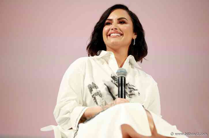 Demi Lovato & Max Ehrich Share Romantic Kiss Dancing to ‘Stuck With U’: Watch