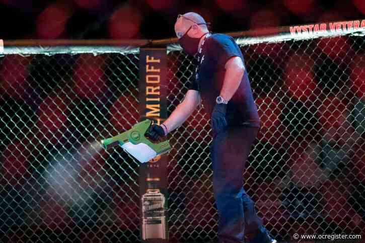 UFC 249 ushers in fan-free, mask-filled era of sports