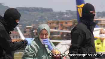 Italian woman returns home after 18 months as hostage in eastern Africa