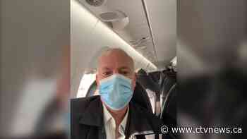 What it's like to travel on a plane in the era of COVID-19