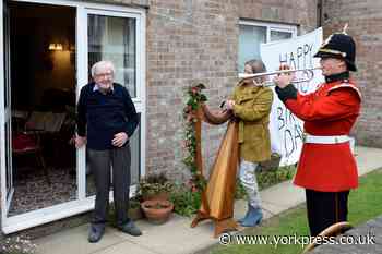 Bugler plays Happy Birthday for Second World War veteran who has turned 100