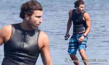 Brody Jenner shows off bulging biceps while riding electric surfboard