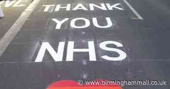 Council workers paint road rainbow tribute to NHS staff