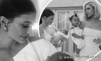 Kylie Jenner looks angelic as she holds nephew Psalm in throwback from Kim and Kanye's vow renewal