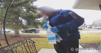 Calgary family shocked by video showing parcel delivery driver spitting and sneezing