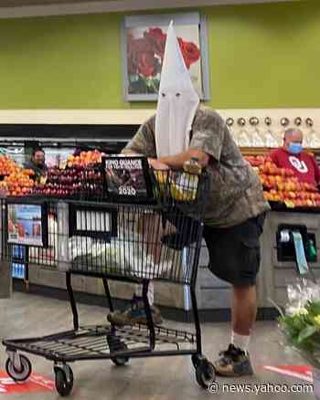 Man who wore KKK hood as mask won't be charged