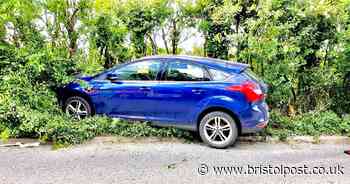 Car driven off busy road in crash