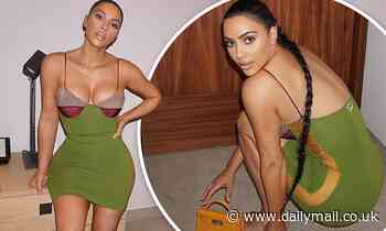 Kim Kardashian showcases her curves in dress as she celebrates reaching 170m Instagram followers