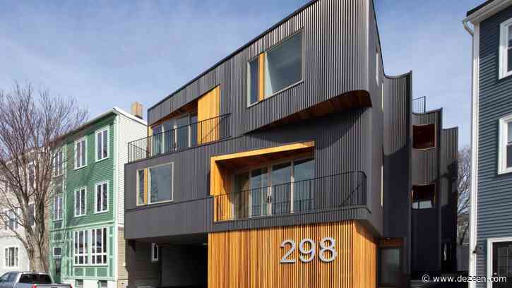 Merge Architects builds bronze-coloured corrugated steel housing facing Boston harbour