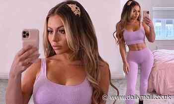 Holly Hagan displays her gym honed abs in a lilac two-piece set