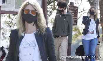 Laura Dern pays homage to director David Lynch during masked dog walk with son, Ellery, 18, in LA