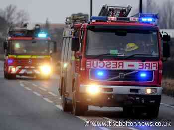 Woman rescued from Radcliffe house fire by firefighters
