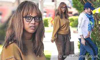 Tyra Banks goes grocery shopping in leopard print
