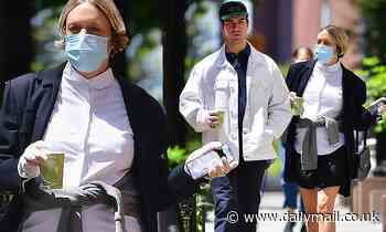 Chloe Sevigny, 45, wears a mask as baby daddy Sinisa Mackovic does not during stroll in NYC
