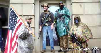 Armed militia members, other protesters demand 'freedom' from Michigan stay-home order