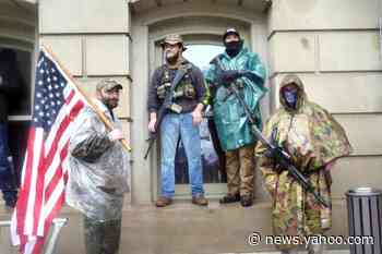 Armed militia members, other protesters demand &#39;freedom&#39; from Michigan stay-home order