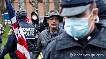 Protester with ax involved in clash at Michigan rally against stay-at-home orders