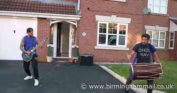 Watch neighbours perform We Will Rock You during Clap for Carers