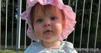 Baby girl loses eye after parents spot something odd on photograph